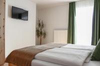 Posteľ alebo postele v izbe v ubytovaní Apartments Rainer