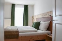 Posteľ alebo postele v izbe v ubytovaní Apartments Rainer
