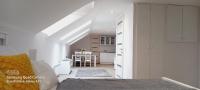Posteľ alebo postele v izbe v ubytovaní Júlia Apartman