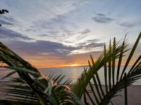a view of the ocean at sunset from the beach at Koh Chang Bailan Beach Resort in Ko Chang