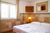 Postel nebo postele na pokoji v ubytování Aparthotel Maracaibo