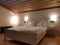 Łóżko lub łóżka w pokoju w obiekcie Bhome Gästehaus b&b / Apartments