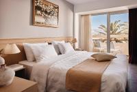 Posteľ alebo postele v izbe v ubytovaní Tylissos Beach Hotel - Adults Only