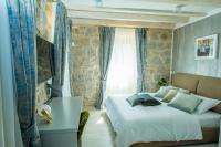 Posteľ alebo postele v izbe v ubytovaní Heritage Villa Vitturi Sea View