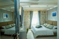 Posteľ alebo postele v izbe v ubytovaní Heritage Villa Vitturi Sea View