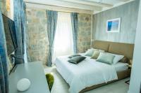 Posteľ alebo postele v izbe v ubytovaní Heritage Villa Vitturi Sea View