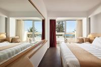 Posteľ alebo postele v izbe v ubytovaní Tylissos Beach Hotel - Adults Only