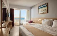 Posteľ alebo postele v izbe v ubytovaní Tylissos Beach Hotel - Adults Only