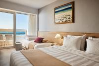 Posteľ alebo postele v izbe v ubytovaní Tylissos Beach Hotel - Adults Only