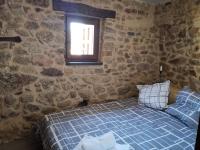 Postel nebo postele na pokoji v ubytování Casa Cristina