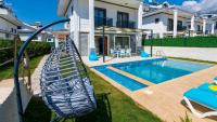 The swimming pool at or close to Hisar 1 - 4 Bedroom Holiday Villa in Hisarönü