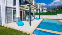 The swimming pool at or close to Hisar 1 - 4 Bedroom Holiday Villa in Hisarönü