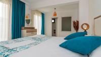 A bed or beds in a room at Hisar 1 - 4 Bedroom Holiday Villa in Hisarönü