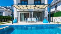 The swimming pool at or close to Hisar 1 - 4 Bedroom Holiday Villa in Hisarönü