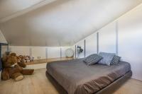 Łóżko lub łóżka w pokoju w obiekcie Luxury Garden House