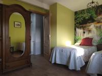 A bed or beds in a room at El Balcon de Peñafiel