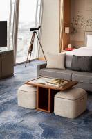 a living room with a couch and a coffee table at Shangri-La The Shard, London in London