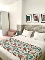 Postel nebo postele na pokoji v ubytování Apartamentos Élite - Art Collection - Frida