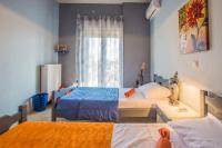 Postel nebo postele na pokoji v ubytování Villa Emily Zakynthos