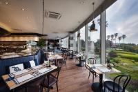 En restaurant eller et andet spisested på Kensington Resort Seogwipo