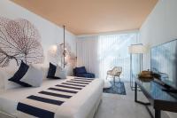 Ein Bett oder Betten in einem Zimmer der Unterkunft Yam Suf by Isrotel Collection