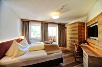 TV a/nebo společenská místnost v ubytování Hotel Dorfstadl