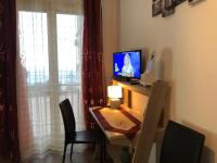 TV a/nebo společenská místnost v ubytování B&B Antonella