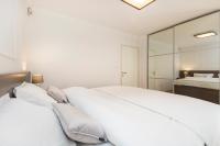 Posteľ alebo postele v izbe v ubytovaní Apartment Parentium