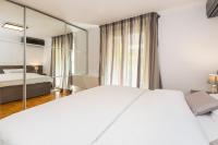 Posteľ alebo postele v izbe v ubytovaní Apartment Parentium