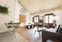 Posezení v ubytování Santiago Premium Loft III