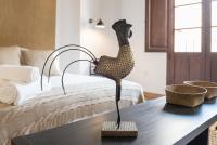 Postel nebo postele na pokoji v ubytování Santiago Premium Loft III