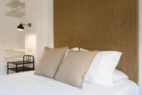 Postel nebo postele na pokoji v ubytování Santiago Premium Loft III
