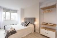 Posteľ alebo postele v izbe v ubytovaní Urbe10 Angel Ganivet 2 Bedrooms Apartment