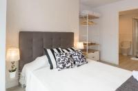 Posteľ alebo postele v izbe v ubytovaní Urbe10 Angel Ganivet 2 Bedrooms Apartment
