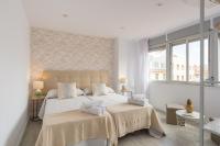 Posteľ alebo postele v izbe v ubytovaní Urbe10 Angel Ganivet 2 Bedrooms Apartment