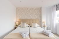 Posteľ alebo postele v izbe v ubytovaní Urbe10 Angel Ganivet 2 Bedrooms Apartment