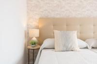 Posteľ alebo postele v izbe v ubytovaní Urbe10 Angel Ganivet 2 Bedrooms Apartment