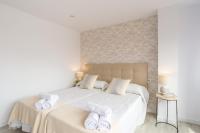 Posteľ alebo postele v izbe v ubytovaní Urbe10 Angel Ganivet 2 Bedrooms Apartment