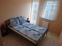 Posteľ alebo postele v izbe v ubytovaní Betti Apartman