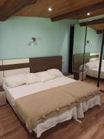 Posteľ alebo postele v izbe v ubytovaní Albergue Bergando