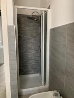 A bathroom at APPARTAMENTO PIERANGELO DI FRONTE MALPENSA T1 e T2
