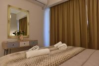 Posteľ alebo postele v izbe v ubytovaní Cozy Luxury Apartment in the Heart of Athens 8-2