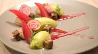 a white plate of food on a table at Best Western Premier Hotel de la Cite Royale in Loches