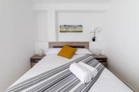Postel nebo postele na pokoji v ubytování Moonkey - Luminoso Apartamento Girasoles