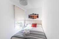 Postel nebo postele na pokoji v ubytování Moonkey - Luminoso Apartamento Girasoles