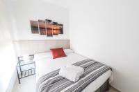 Postel nebo postele na pokoji v ubytování Moonkey - Luminoso Apartamento Girasoles