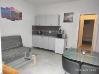 Kuchyňa alebo kuchynka v ubytovaní Apartmani QUATTRO