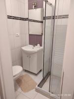 Kúpeľňa v ubytovaní Apartmani QUATTRO