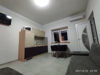 Kuchyňa alebo kuchynka v ubytovaní Apartmani QUATTRO