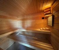 an empty sauna with wooden walls and ceilings at Le Refuge du Rempart in Dambach-la-Ville